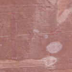 Peekaboo rock art panel with very old outlined figures
