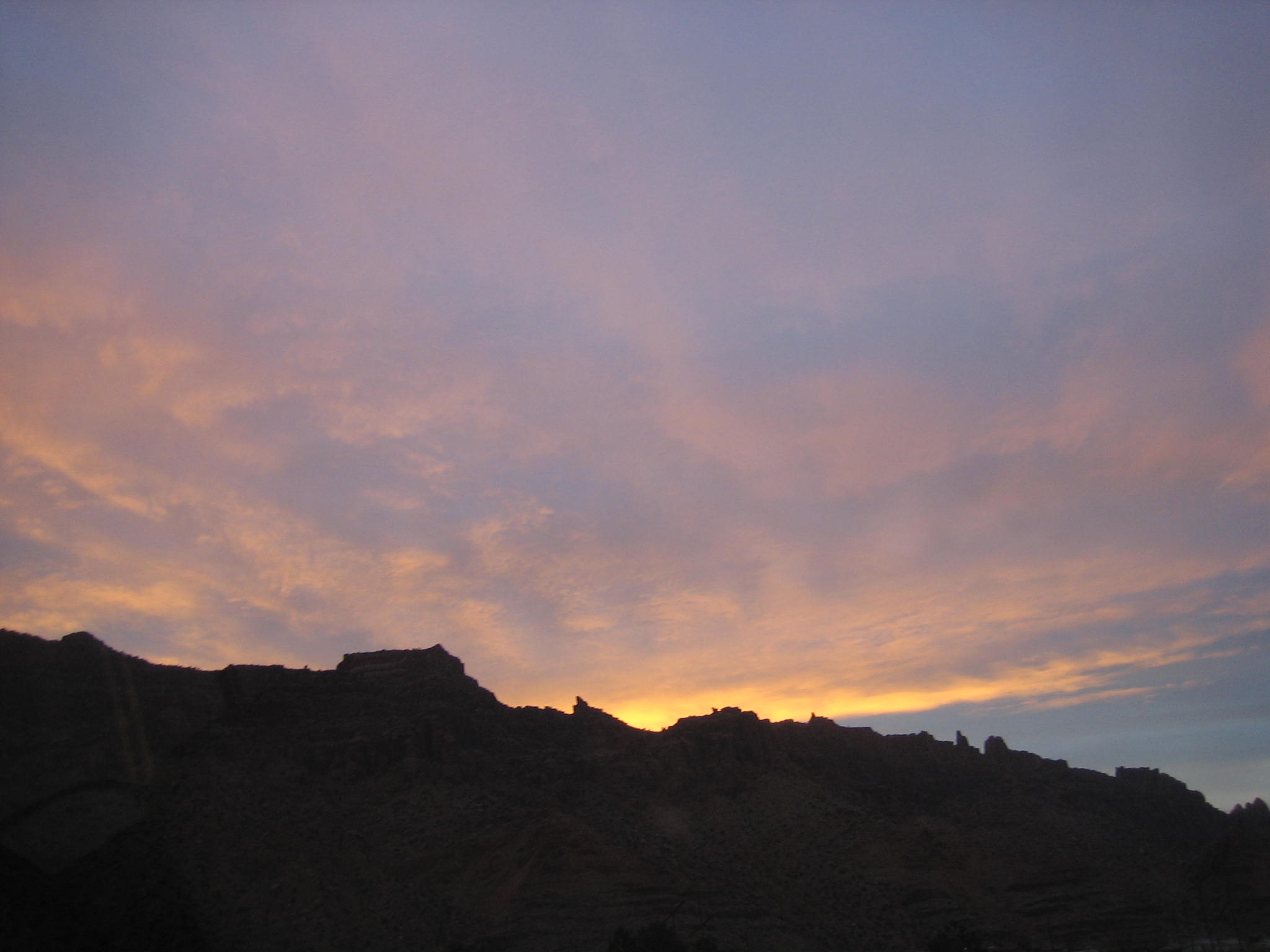 Sunset over cliffs over Moab