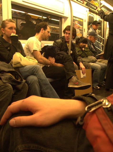 a portrait of andrei's hand on the subway